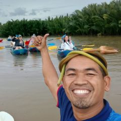 Kayakers paddling through the Green Cathedral canals