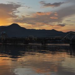 Sunset over the Kampot river and bridge